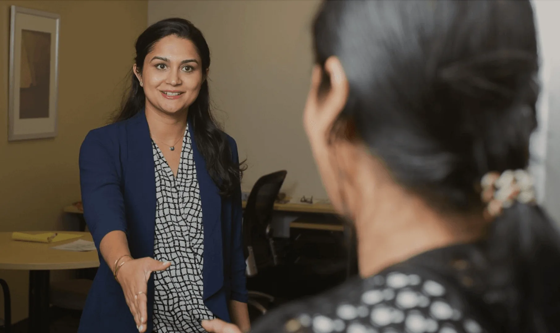 Attorney Himani consulting with a client