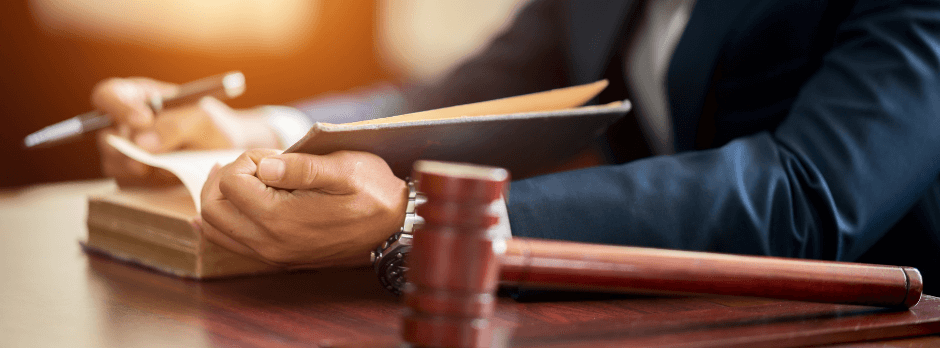 male lawyer reading court case