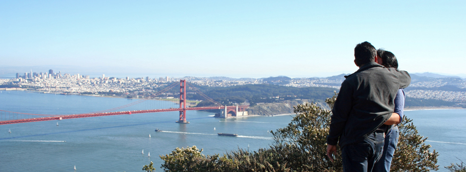 couple looking at the golden gate bridge together