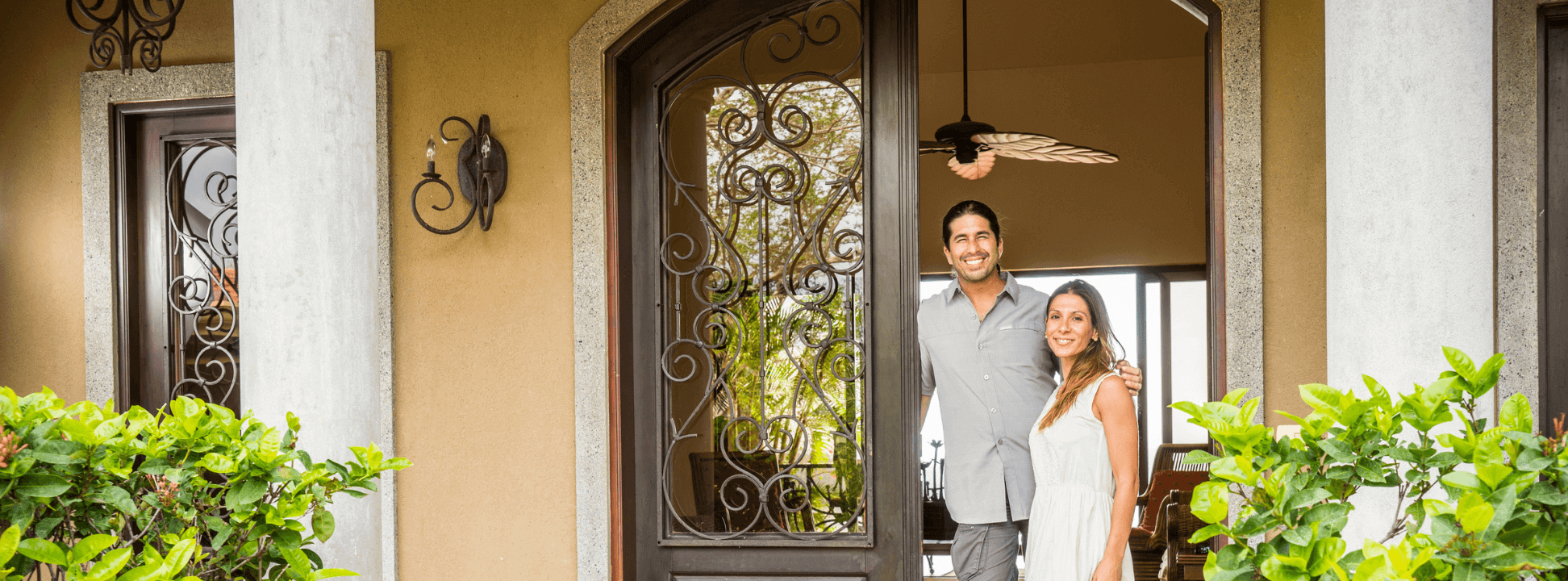 home owners outside their home