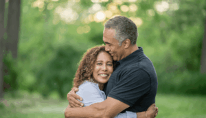 husband and wife hugging