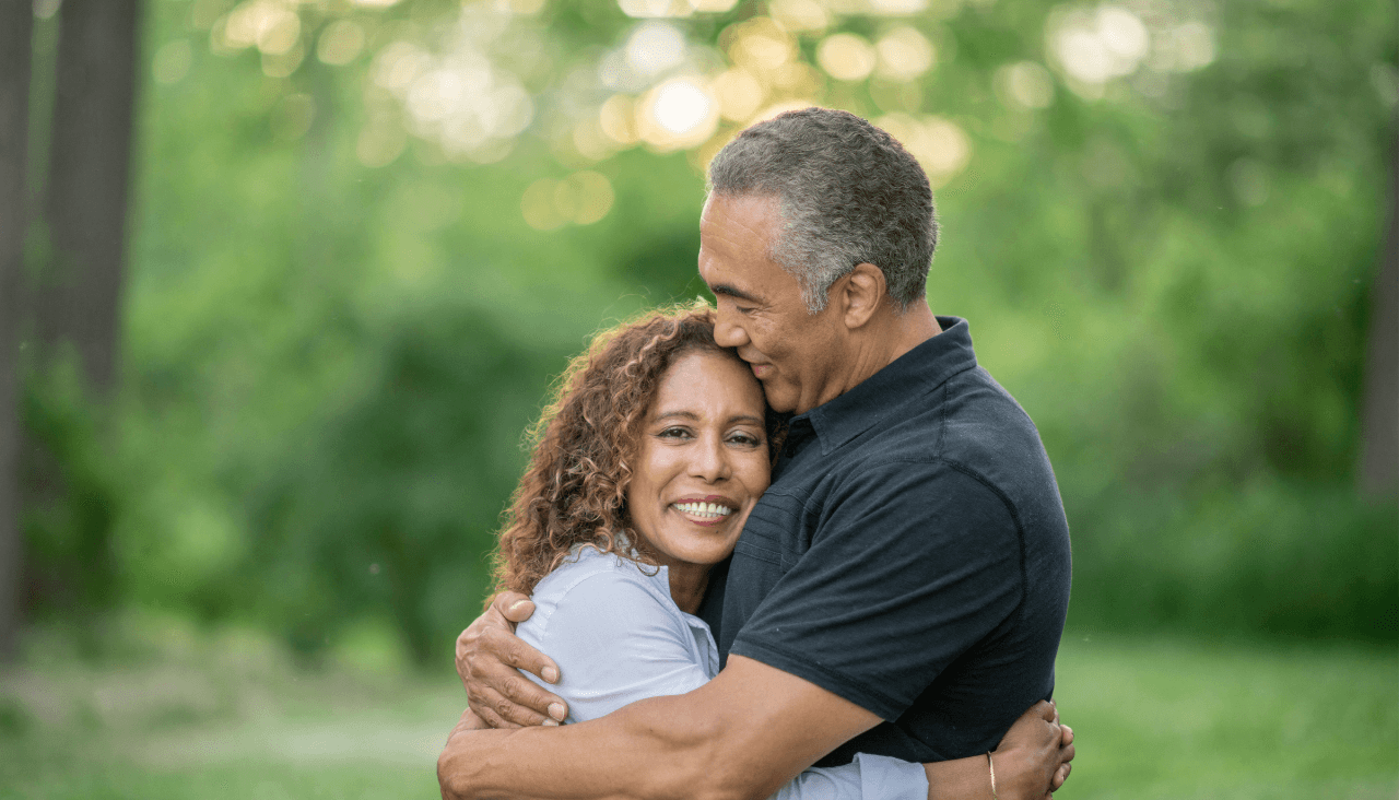 husband and wife hugging